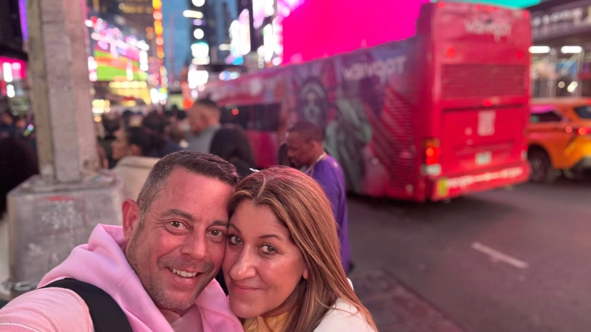 Kerri and Si together beneath the city lights