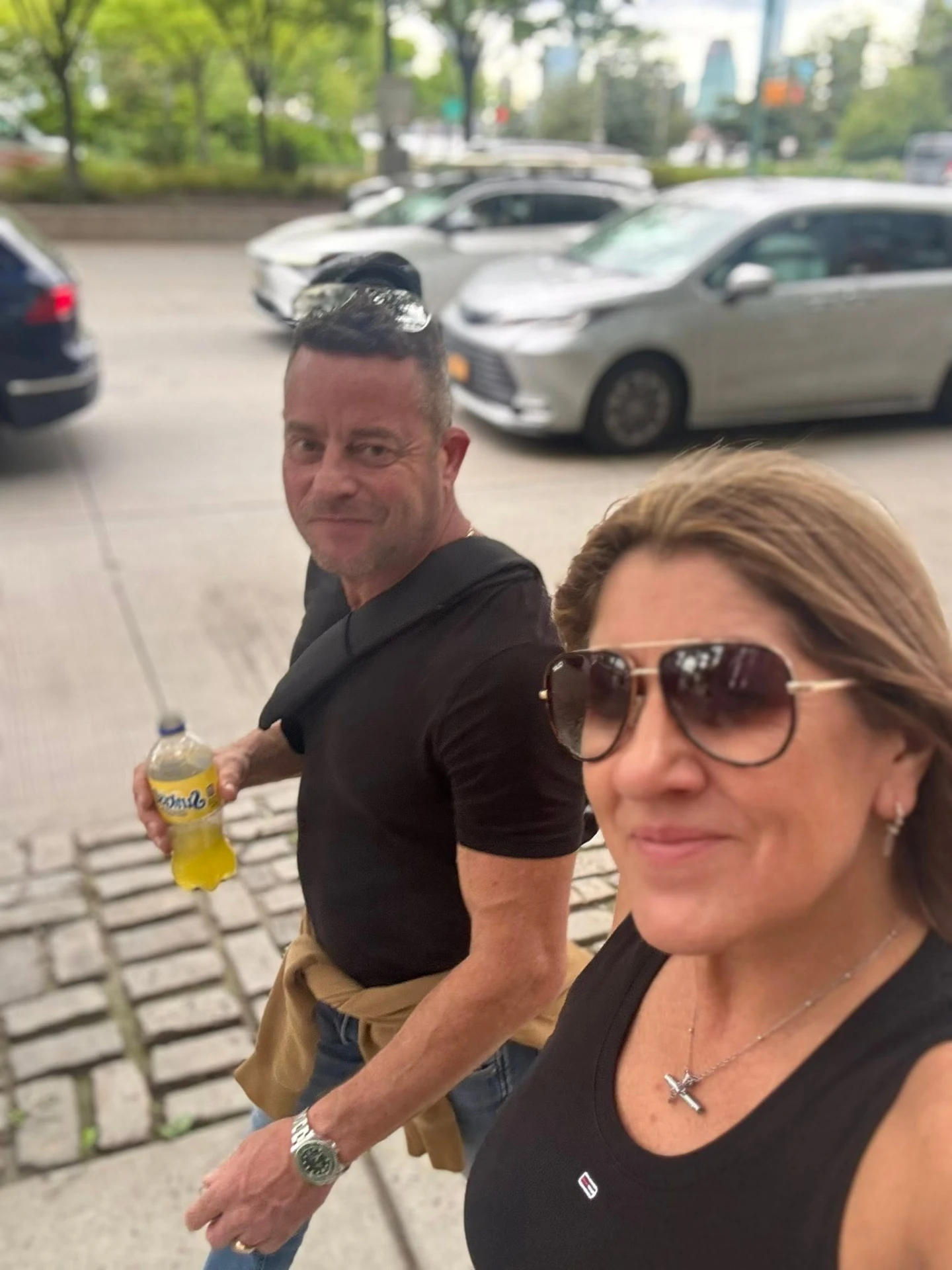 Kerri and Si walking together in the city